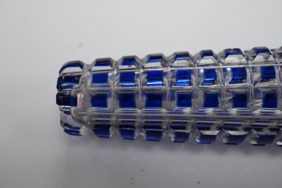 A 19th century blue overlay glass scent bottle with square ribbed design, 12cm long. Condition - good